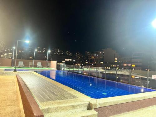Πισίνα στο ή κοντά στο Loft/Apartaestudio Chapinero con piscina gym