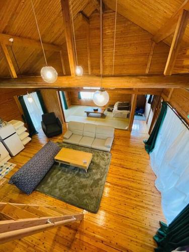 an overhead view of a living room in a house at Wood retreatみやざき in Miyazaki
