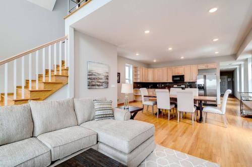 a living room with a couch and a table at Stunning 2 Floor Penthouse Downtown in Chicago