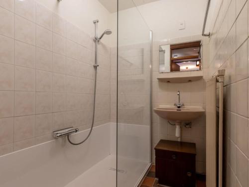 a bathroom with a shower and a sink at Holiday Home in Veere near Historic Center in Veere