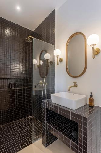 Bilik mandi di RIYURI GUESTHOUSE