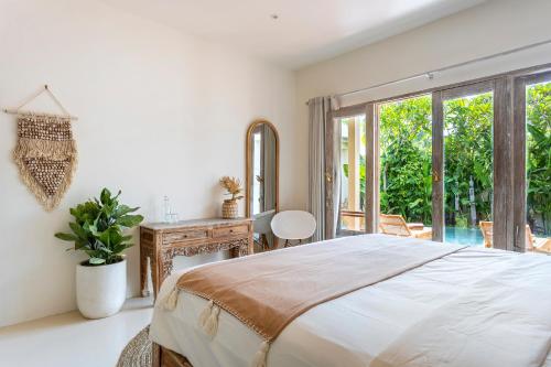 Katil atau katil-katil dalam bilik di RIYURI GUESTHOUSE