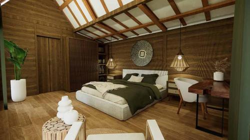 sypialnia z łóżkiem, stołem i biurkiem w obiekcie Villa Sebelah by Optimum Bali Villas w mieście Seminyak