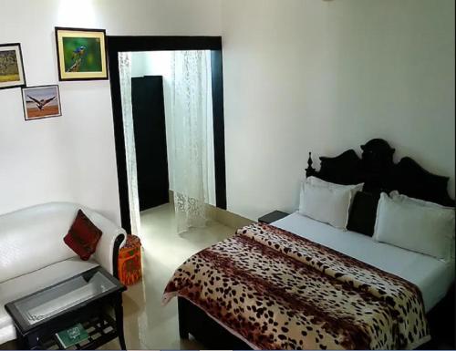 Cama o camas de una habitación en Hotel Kiran Villa Palace, Bharatpur