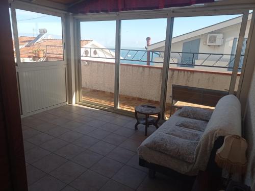 Балкон или терраса в Mansarda con terrazzo vista mare