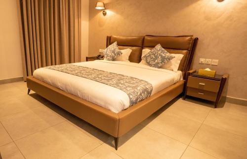 a bedroom with a large bed in a room at My Hotel by Trend in Aqaba