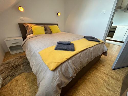 Postel nebo postele na pokoji v ubytování Apartment A1