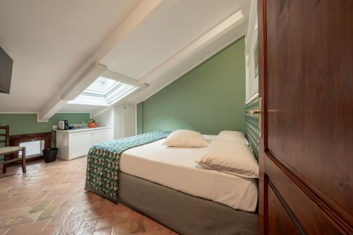 a bedroom with a bed in a room at Affittacamere Valentina in Orvieto