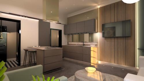 a kitchen with a sink and a counter top at Bridge Steet Apartments in Morpeth