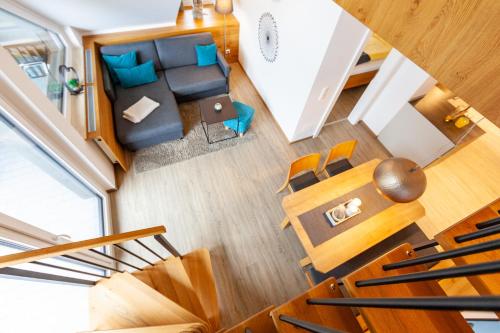 an overhead view of a living room and dining room at Seehaus Winkler in Weissensee