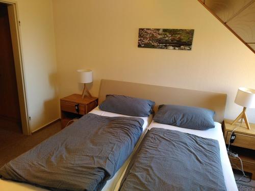 Katil atau katil-katil dalam bilik di Bio-Hotel Zum Forsthaus