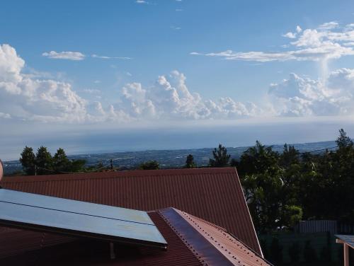 a view from the roof of a house at Appartement 974 in Le Tampon