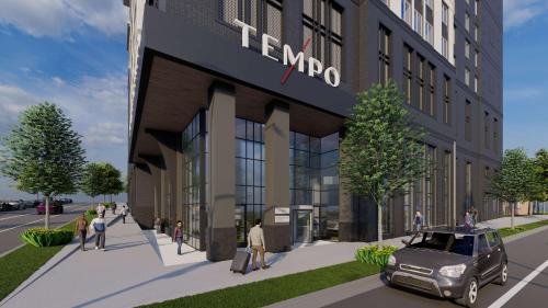 a rendering of a rendering of the entrance to a building at Tempo By Hilton Raleigh Downtown in Raleigh