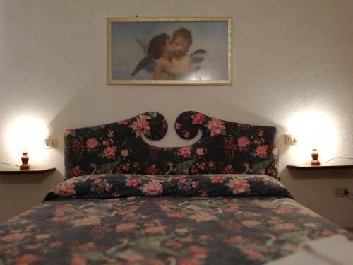 เตียงในห้องที่ Agriturismo Selvoli - La Civetta