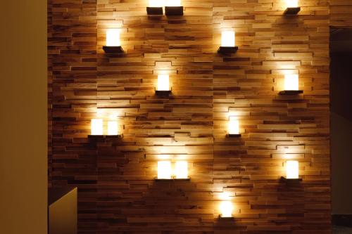 a wall with lights on a brick wall at Miramare Beach Hotel - Ultra All Inclusive in Side