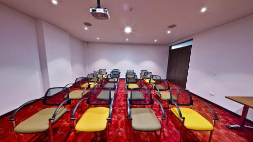 a conference room with chairs and a table in it at AZ Hotel in Bogotá