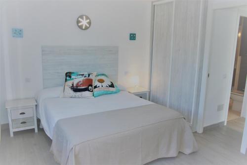 En eller flere senge i et værelse på Can Jané Port d Alcudia