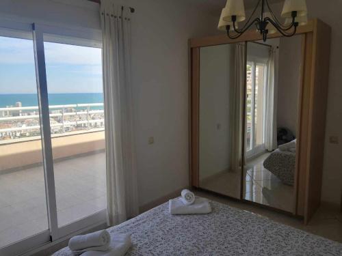 Postel nebo postele na pokoji v ubytování A H RENTALS Montemar 10 Apartamento Atalayas