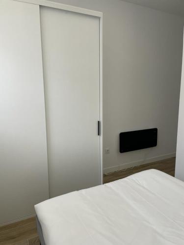 Кровать или кровати в номере Exyca Metropolitano