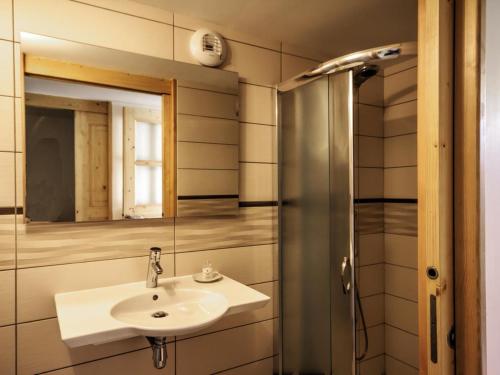 a bathroom with a sink and a mirror at Gîte La Valla-sur-Rochefort, 5 pièces, 10 personnes - FR-1-496-44 in La Valla