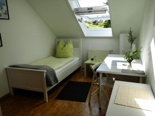 Una cama o camas en una habitación de Ferienwohnung Hotte´s Hütte