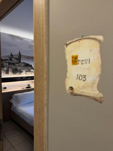 Postel nebo postele na pokoji v ubytování Hotel Cladan