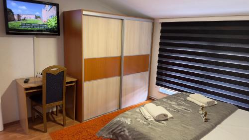 Una cama o camas en una habitación de Zigana Apartments