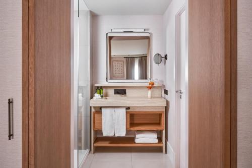 a bathroom with a sink and a mirror at Boutique Hotel Posada Terra Santa in Palma de Mallorca