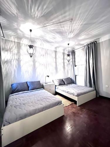 Postel nebo postele na pokoji v ubytování MorabezaHome- Apartment Tati