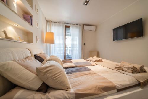 Un pat sau paturi într-o cameră la Apartament 36 Międzymorze 10