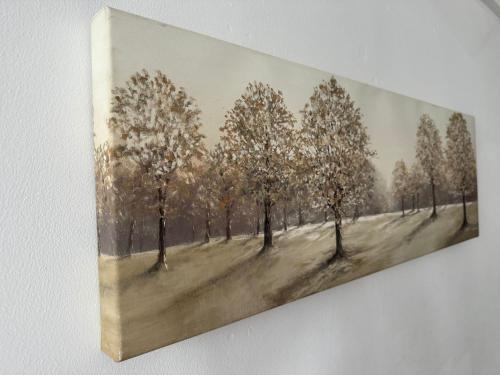 a painting of trees in a field on a wall at Scotch Terrace - 3 Bedrooms - Sleeps 6 in Whitehaven