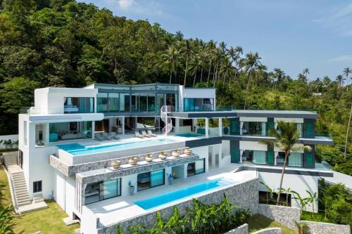 an aerial view of a villa with a swimming pool at Villa Murano Samui in Amphoe Koh Samui