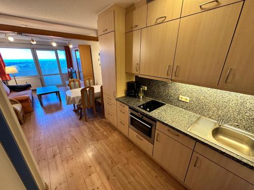 Kuchyň nebo kuchyňský kout v ubytování Ostseeferienwohnung K1317 mit Meerblick
