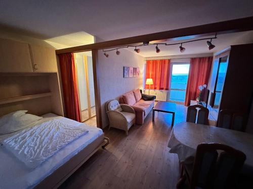 Postel nebo postele na pokoji v ubytování Ostseeferienwohnung K1317 mit Meerblick