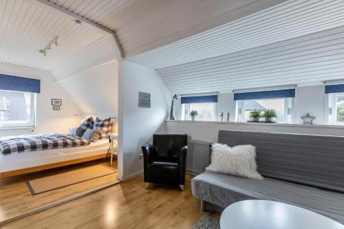 Giường trong phòng chung tại Ferienwohnung Schwennautal