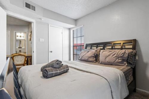 a bedroom with two beds and a window at Extended Stay Affordable in North Dallas in Dallas