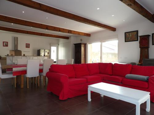 Ein Sitzbereich in der Unterkunft Spacieuse villa a St Cyprien pour 15