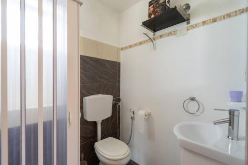 Ένα μπάνιο στο Villa Luana Punta Prosciutto