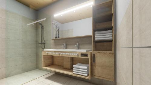 a bathroom with a sink and a shower at Hotel zum Schwanen - Appartement 1 in Pflach