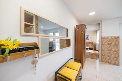 Kuchyň nebo kuchyňský kout v ubytování Apartment Orange Oasis