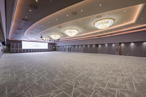 a large ballroom with a large dance floor in a building at InterContinental Barcelona by IHG in Barcelona
