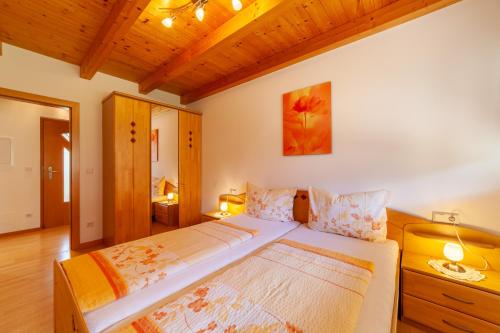 Säng eller sängar i ett rum på Heiligenhof