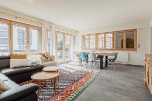 Posezení v ubytování Logement spacieux et charmant