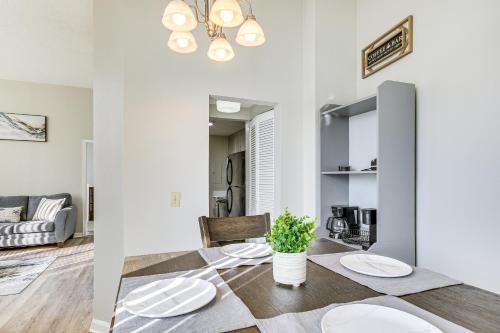 a dining room and living room with a table and chairs at Columbia Vacation Rental - Walk to UofSC Campus! in Columbia