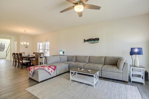 a living room with a couch and a table at Ocean View Home with Kayaks about 2 Mi to Bethany Beach in Ocean View