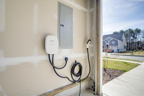 a hose hooked up to a wall with a window at Ocean View Home with Kayaks about 2 Mi to Bethany Beach in Ocean View