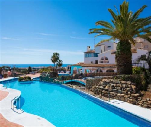 a view of a swimming pool at a resort at Los Limoneros in Nerja