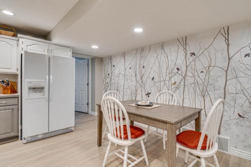 a kitchen with a dining room table and chairs at Lovely Remodeled North Salt Lake Apt 7 Mi to Dtwn in North Salt Lake