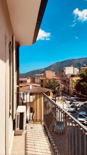 a balcony of a building with a view of a street at B&B Aria Ona in Villagrande Strisaili