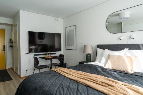 מיטה או מיטות בחדר ב-Consultant's Luleå Hub: Work & Rest